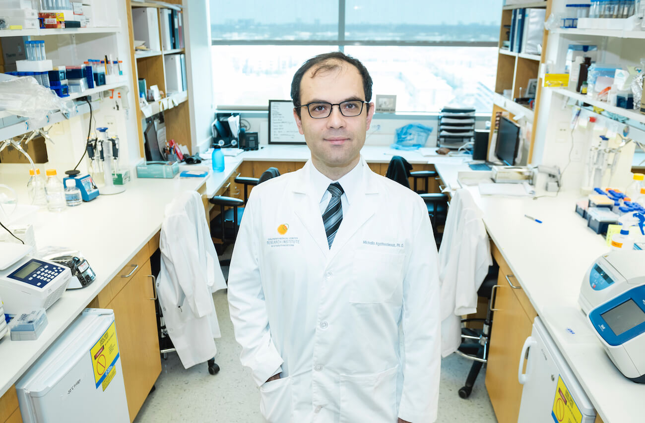 Michalis Agathocleous, stem cell researcher, stands in the lab. 